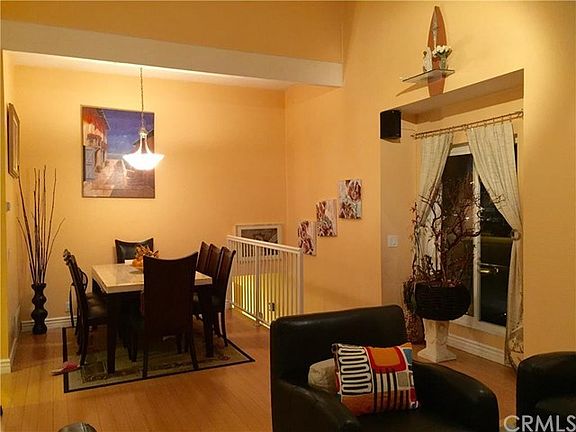 Light and bright through out, high ceilings and window let the lights stream in over the dinning area and keeps the living, dinning, kitchen areas bright and filled with sun shine.