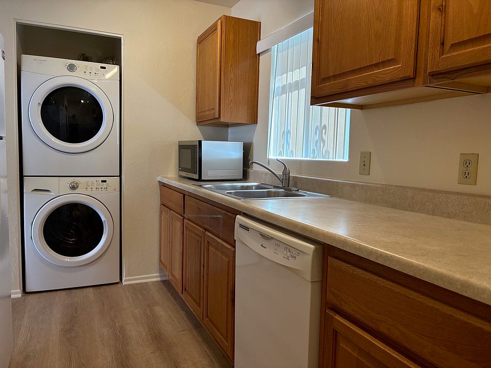 Kitchen, also showing washer and dryer
