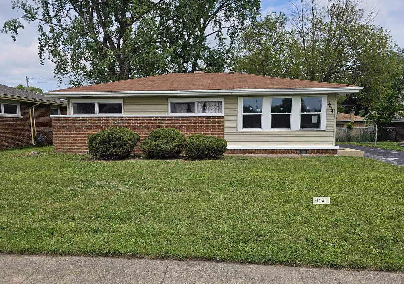 Charming 3-Bedroom Ranch with Modern Updates and Ample Parking — Photo 1