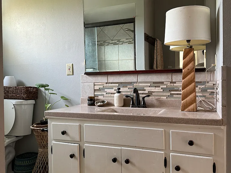Bathroom adjacent to primary bathroom
