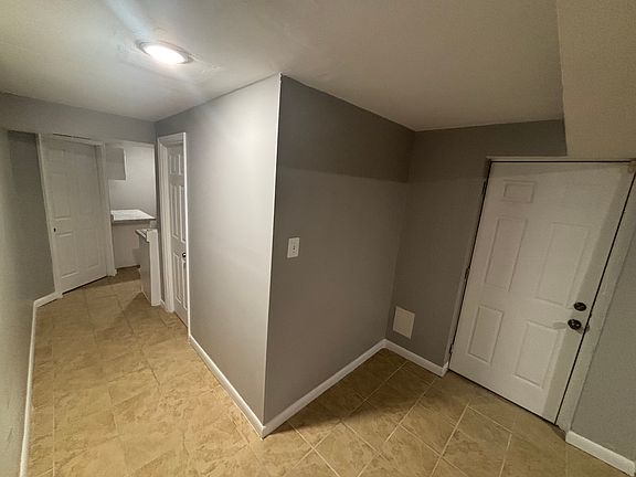View of Entrance and Hallway to Bathroom and Kitchen