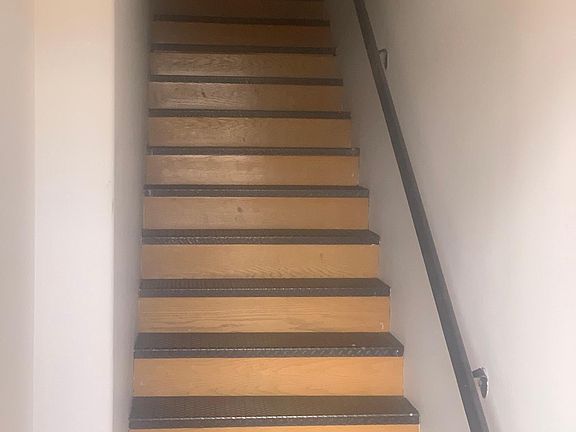 ENTRANCE, STAIRS UP TO THE UNIT