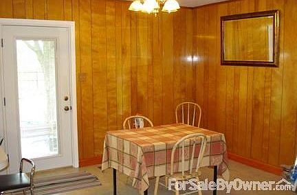 Dining area with real maple paneling