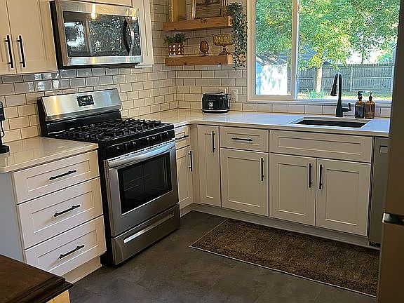 Quartz counters, subway tile