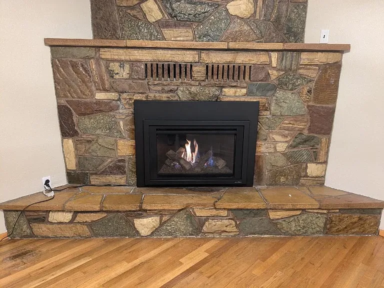 Brand new Gas insert Fireplace with outlets on each shelf and mantel for creative displays