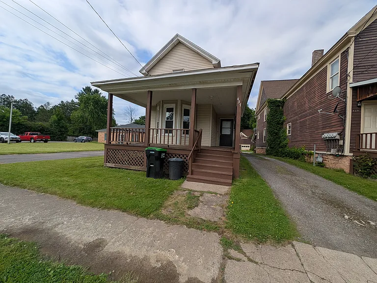 Front View of Unit. Duplex with large front porch