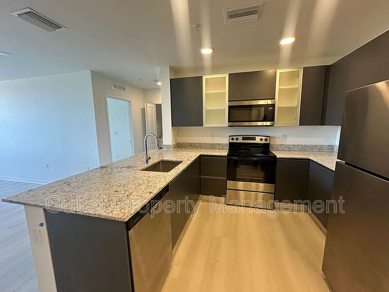 Building Photo - 5587 Millenia Park Blvd #504