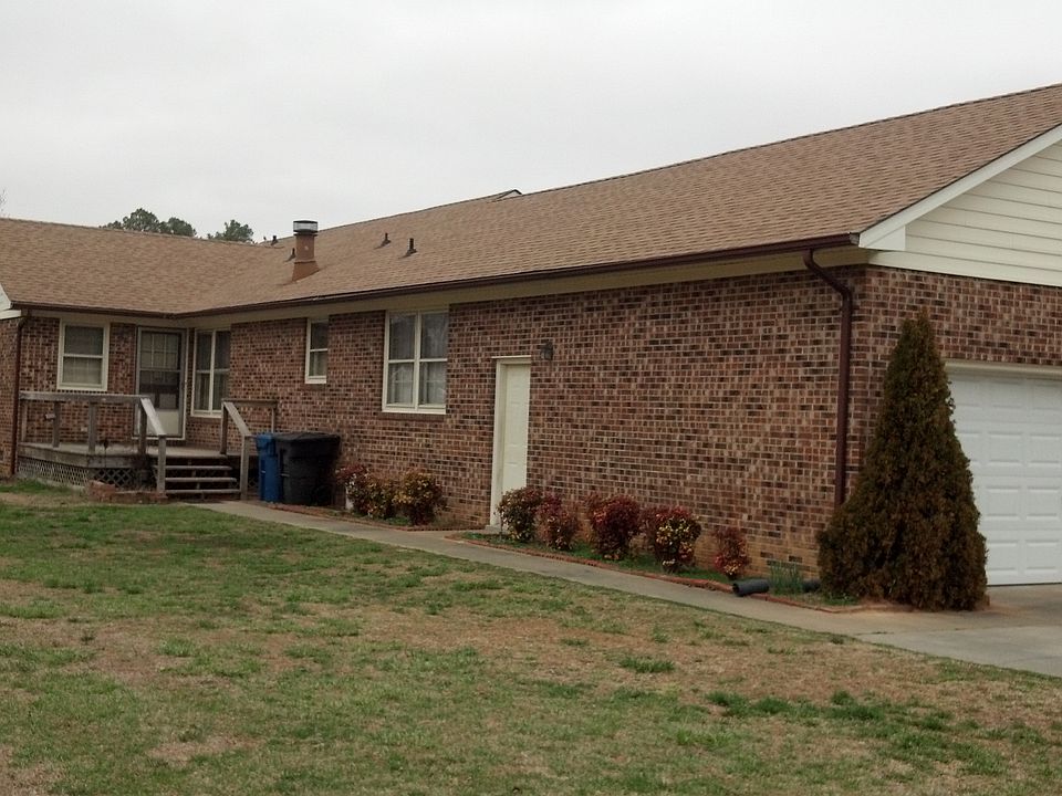 Back side of brick one story. Two car garage.  See front on sat pic til listed