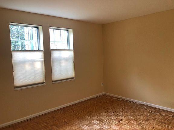 Another large, sunny bedroom