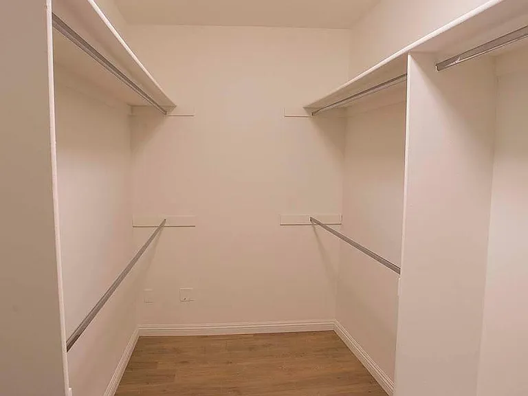 Master bed walk in closet