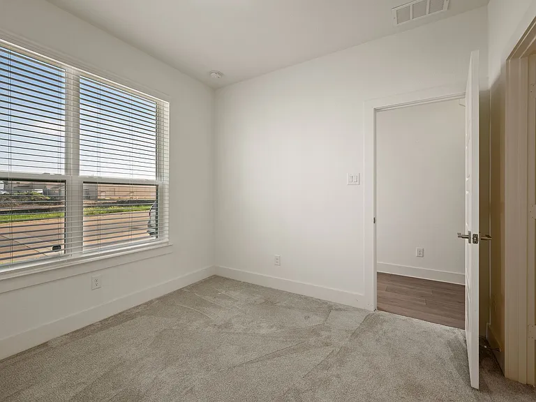 Bedroom #2 with large closet and en suite full bathroom