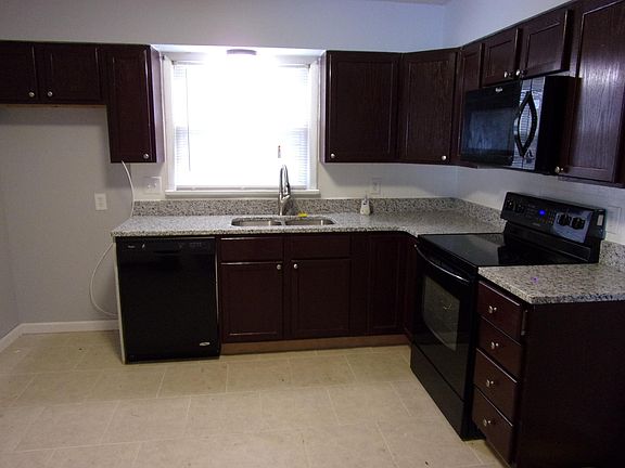 Eat in Kitchen with new cabinets and granite counter tops