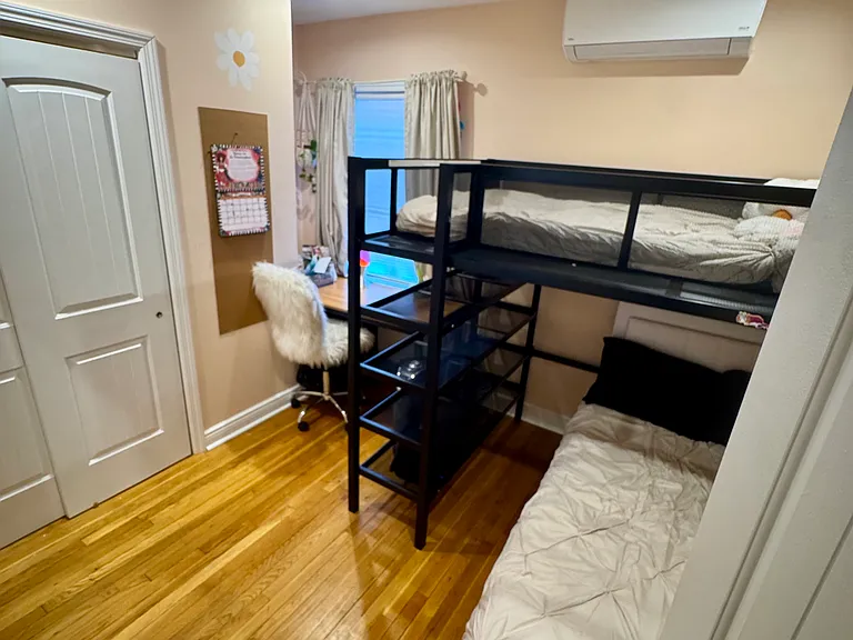 Second bedroom with a full and an twin