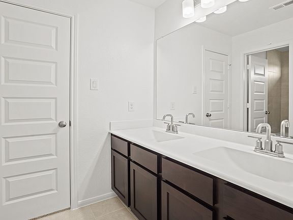 Double sinks in bedroom 2-3 bath