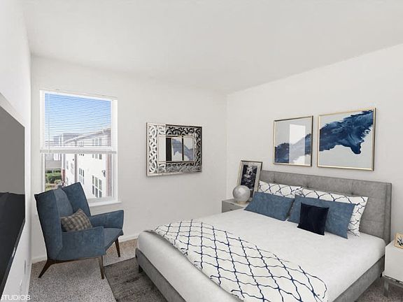 Bright bedroom with large windows