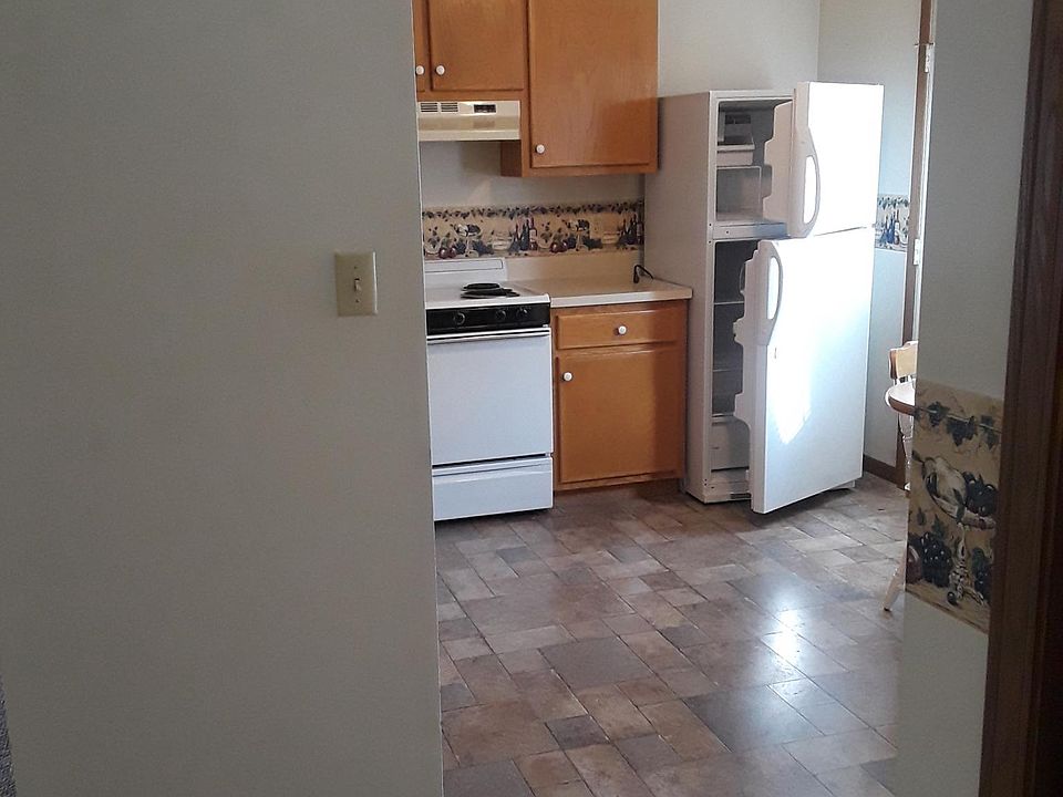 Kitchen view from basement entrance.