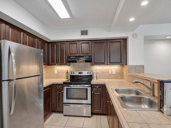 4th image of 1733 Village Boulevard #105