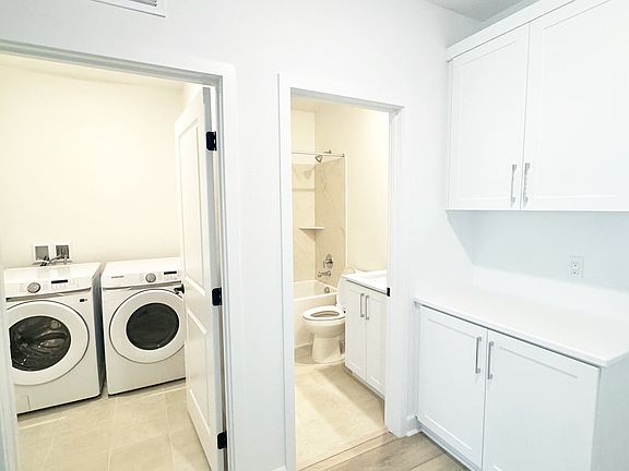 Hallway with storage cabinets