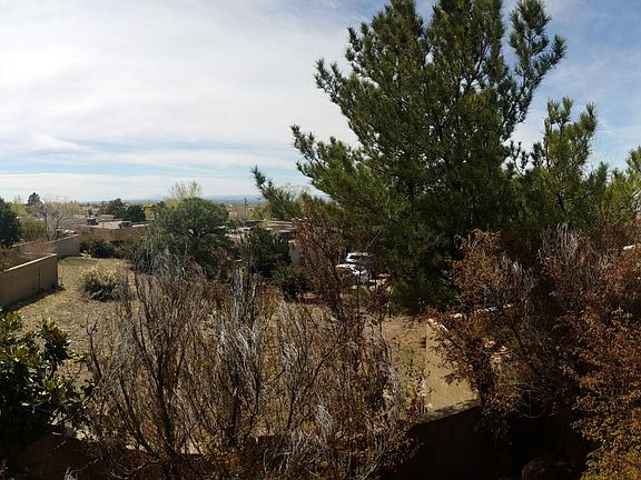 Looking SW off balcony above backyard