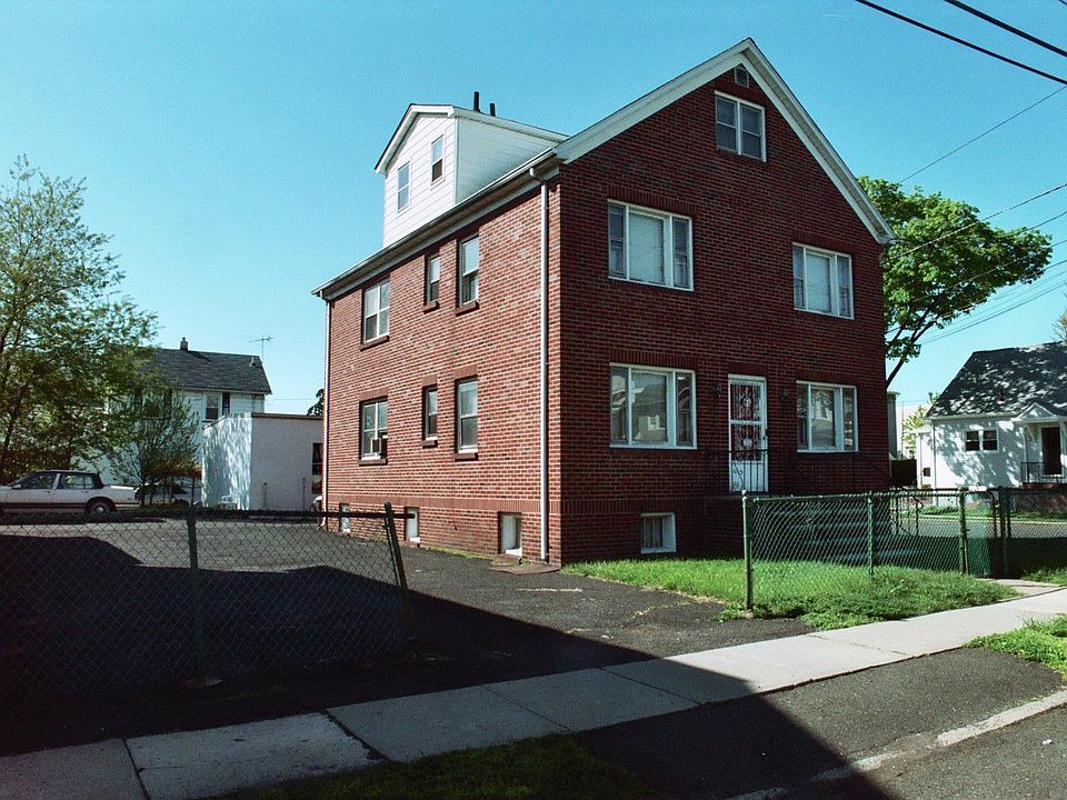 Brick Two Family with Parking for 12 Cars