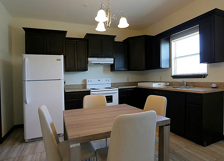 Merida Vista Apartments in Laredo, TX - Interior Granite Counter Top Kitchen Room with Appliances