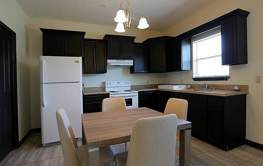 Merida Vista Apartments in Laredo, TX - Interior Granite Counter Top Kitchen Room with Appliances