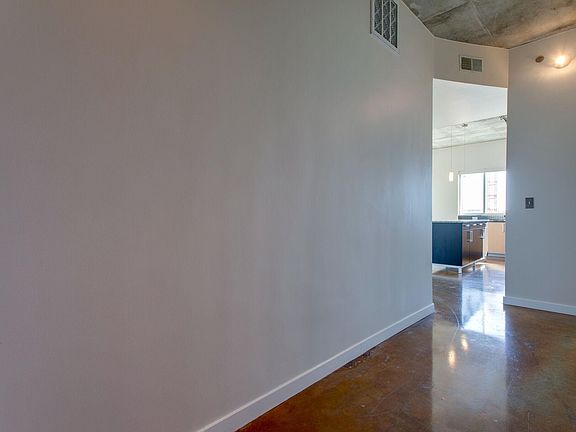 Gallery wall as you enter the unit; great for hanging your art!