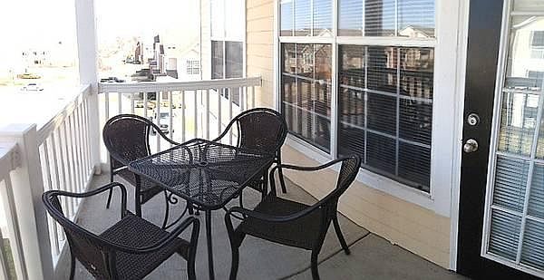 The balcony will face our beautiful courtyard