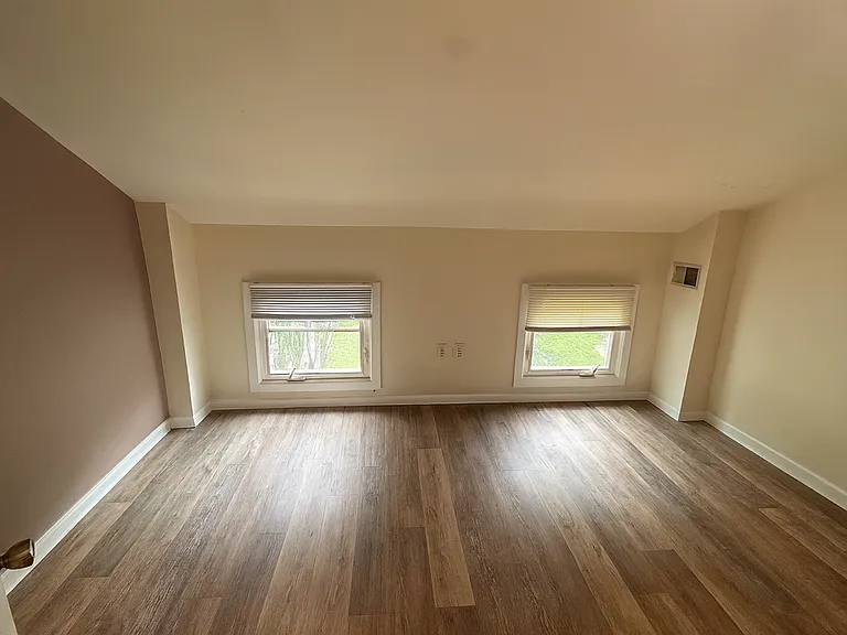 3rd Floor Back Bedroom. ** This photo was altered with similar flooring that is being installed