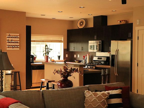 Lots of good light through several windows in kitchen, dining & living room area. Warm & comfortable:)