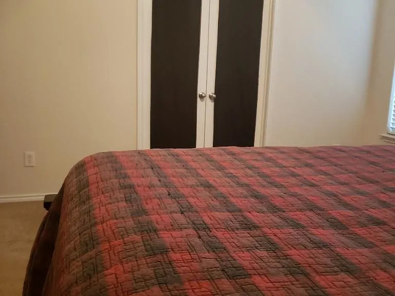 Master bedroom doors closed to 4 BR