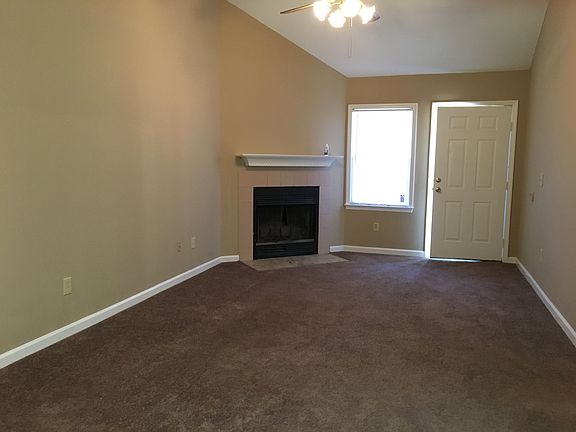 Livingroom with wood burning fireplace