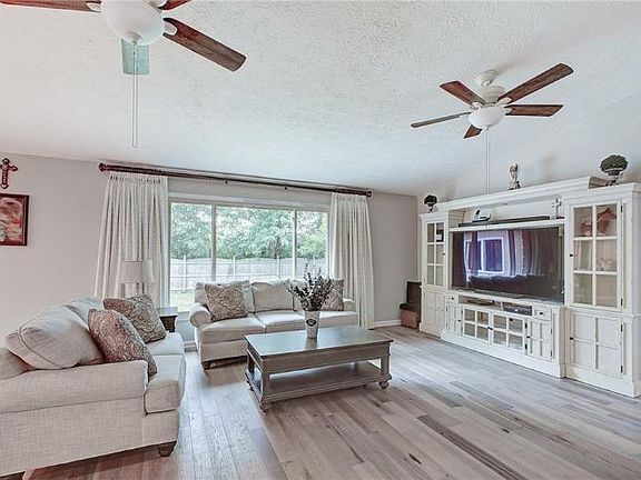 3rd image of 10438 Whispering Winds St