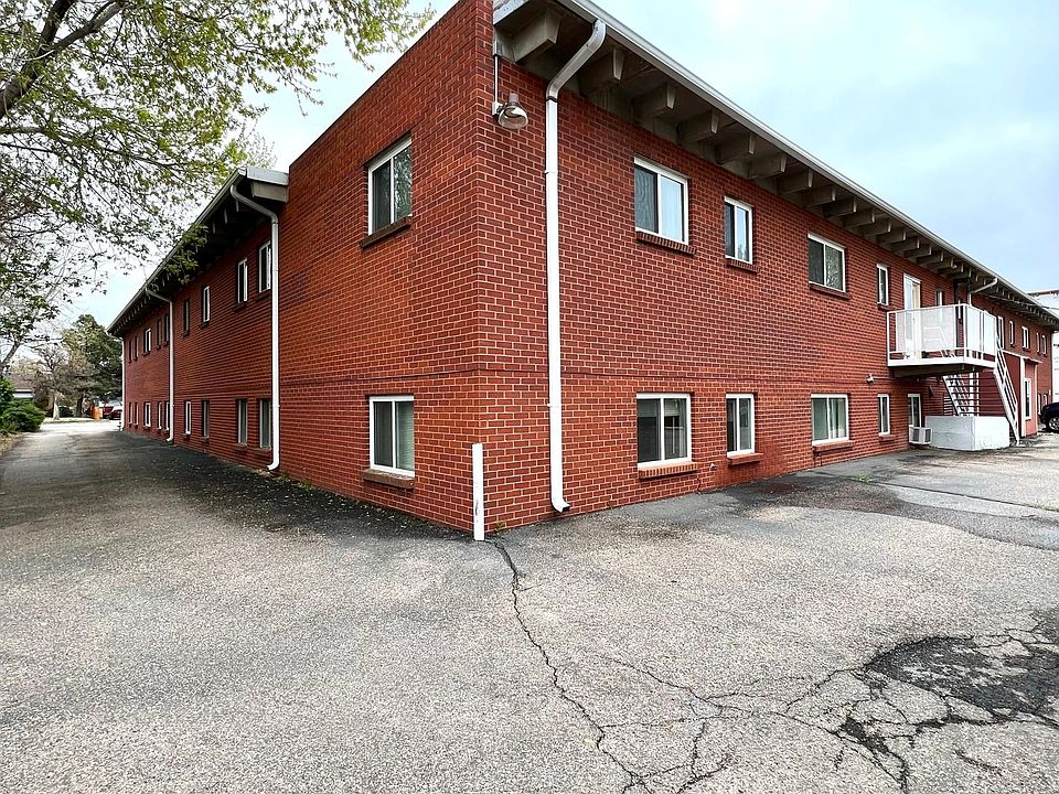 Corner view of building and side driveway