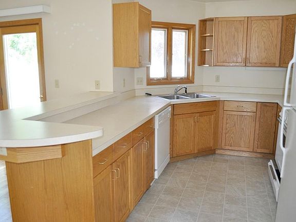 Spacious kitchen with lots of cabinet space.