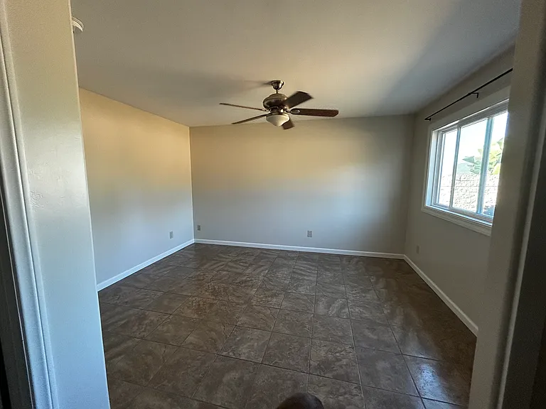 View of bedroom, from standing in front of large closet