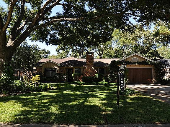 Nestled in among the huge oak trees, this home sits on a 10,000+ sq.ft. lot.