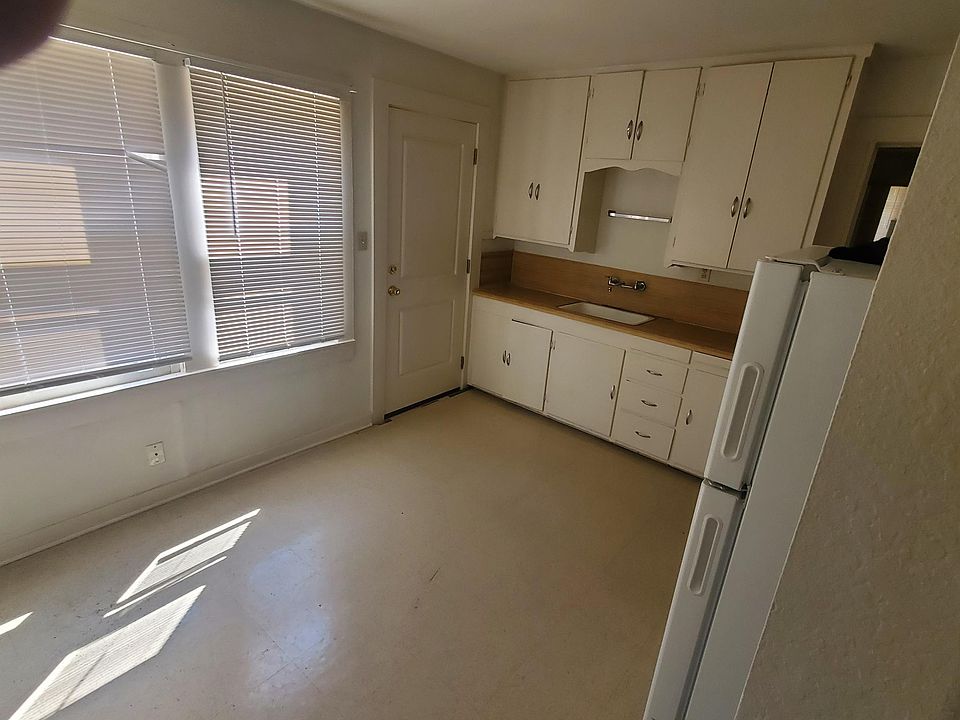 Plenty of natural light and cabinet space. Blinds included!