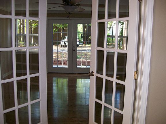 French doors leading into versatile office/game room, bedroom, etc.