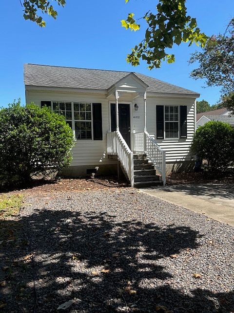 Front of house, parking for 2-3 cars.