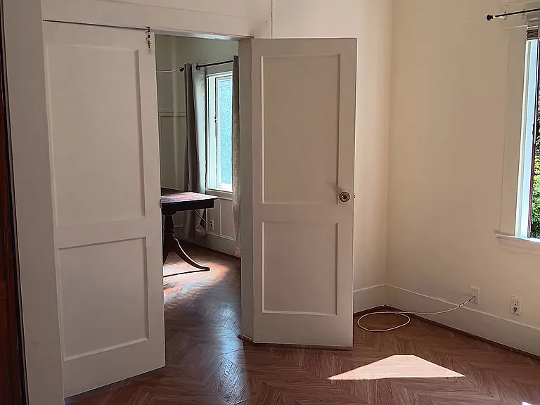 First bedroom with double doors
