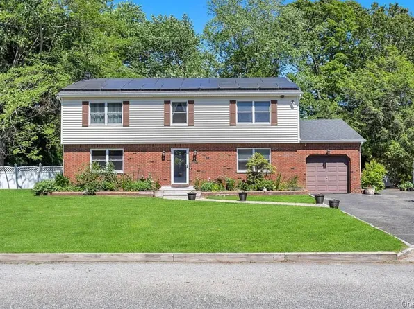 83 Strathmore Village Dr, South Setauket, NY 11720