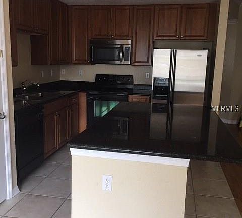 3rd image of 9852 W Park Village Dr