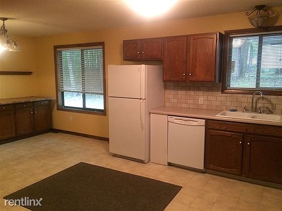 large eat-in kitchen with lots of storage in buffet and pant