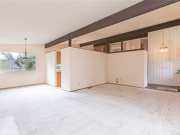The Living room and dining room with super bright light, entry is on your right.