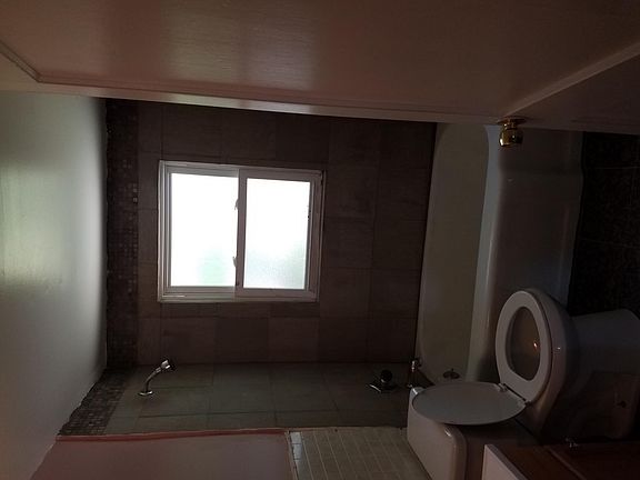 4th image of 9509 Theodosia Ave