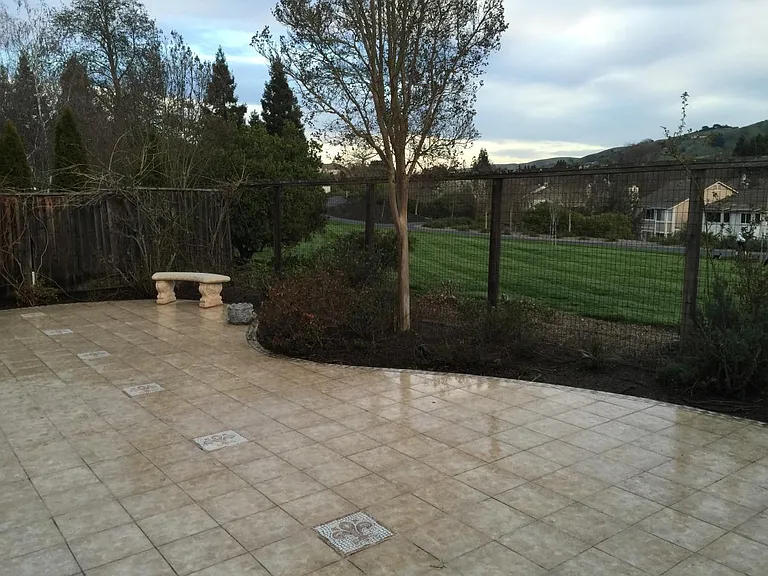 Back patio overlooking private green belt