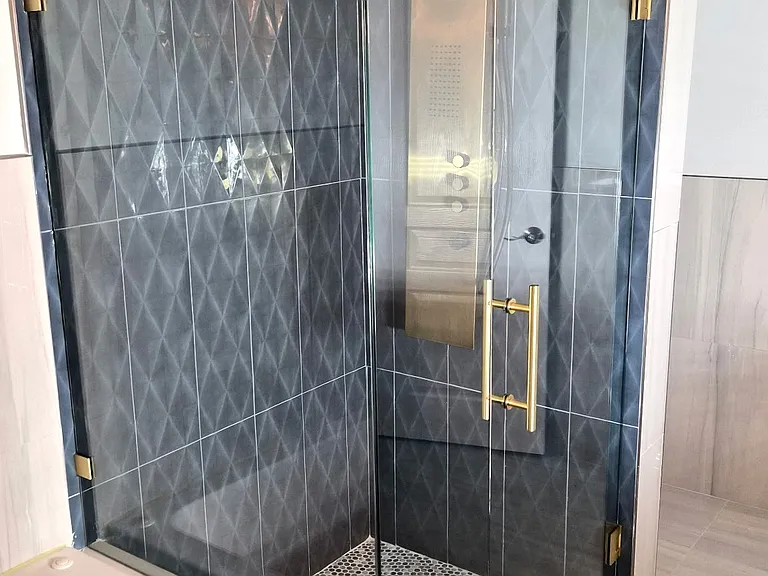 Master shower with rain and massage panel