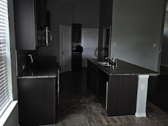 Door far right is laundry room