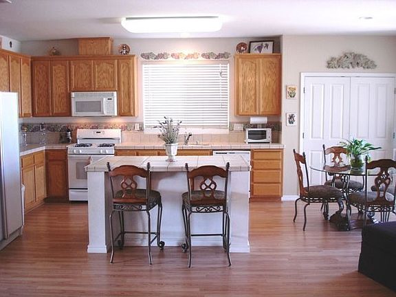 Kitchen opens to Family roo.